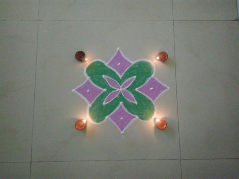 Rangoli A very easy and simple dots kolam, with rangoli colour's. Even begginer's can try, specialy for chinna vasal ( Small place) in an a... Simple Rangoli Kolam Designs With Colour, Vilakku Kolam Rangoli, Ratham Kolam With Dots, Vilaku Kolam Rangoli, Karthigai Deepam Kolam Rangoli, Dots Kolam, Dot Rangoli, Pulli Kolam, Rangoli Colours