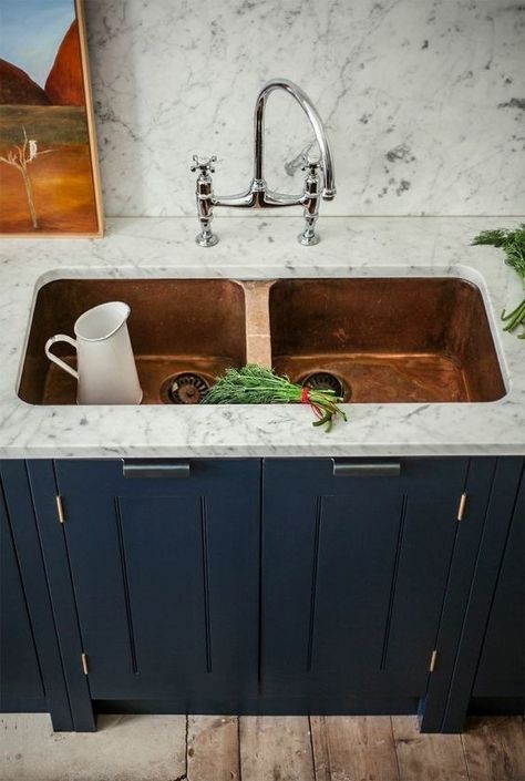 This gorgeous copper kitchen sink that just made me drool a little bit. | 23 Insanely Gorgeous Sinks You're Going To See All Over Pinterest British Standard Kitchen, Kitchen With Marble, British Kitchen, Copper Sinks, Copper Kitchen Sink, Blue Kitchen Cabinets, Marble Counter, Blue Cabinets, Copper Sink