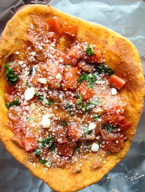 Looking for a new twist on pizza? The whole family will love this deep fried pizza that you can easily make at home. Deep Fried Neapolitan Pizza is made from a potato based dough that is then deep fried and topped and baked with fresh tomatoes, basil, and parmesan cheese. You'll love this homemade fried pizza recipe with a delicious potato dough. #FriedPizza #PizzaRecipe Fry Bread Pizza, Deep Fried Pizza Dough, Fried Pizza Dough, Deep Fried Pizza, Potato Dough, Fried Pizza, Parmesan Cheese Potatoes, Roasted Artichoke, Neapolitan Pizza