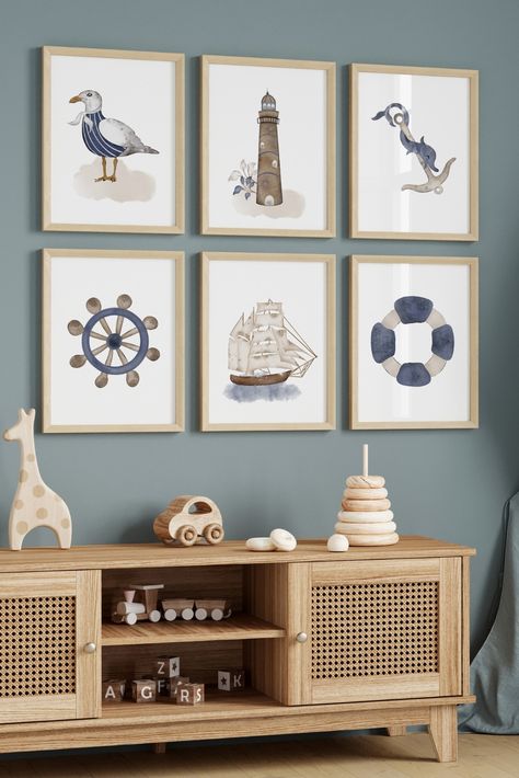 Introducing our exquisite set of 6 Nautical Nursery Prints, designed to transform your little one's space into a captivating maritime haven.Bring the allure of the sea into your child's nursery with our set of 6 Nautical Nursery Prints. Watch as their eyes light up with wonder and their imagination sets sail on countless adventures. Whether as a gift or a cherished addition to your own home, these prints will create a truly magical and inspiring environment for your little one. Upscale Playroom, Boat Nursery Theme, Nautical Nursery Ideas, Vintage Nautical Nursery, Boy Nursery Nautical, Nautical Boys Room, Nautical Kids Bedroom, Nautical Boy Room, Nautical Baby Nursery