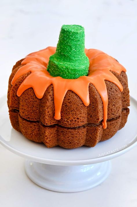 Celebrate the season with a shortcut recipe for Easy Pumpkin Bundt Cake that transforms store-bought cake mix into the ultimate fall dessert. #justatasterecipes Pumpkin Bundt Cake With Box Cake, Halloween Bundt Cake, Pumpkin Bundt Cakes, Mini Bunt Cake, Gooey Desserts, Pumpkin Bundt Cake Recipes, Mini Bundt Cakes Recipes, Pasteles Halloween, Pumpkin Bundt