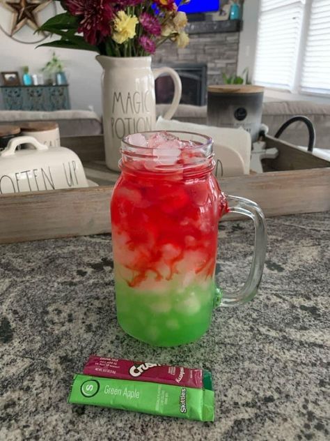 Christmas Water Flavors, Skittles Loaded Tea Recipe, Skittles Drink Mix Recipe, Water Flavors Ideas, Mt Dew Water Recipe, Green Apple Water Recipe, Water Bar Recipes, Skittles Water Flavor Recipes, Flavor Water Recipes