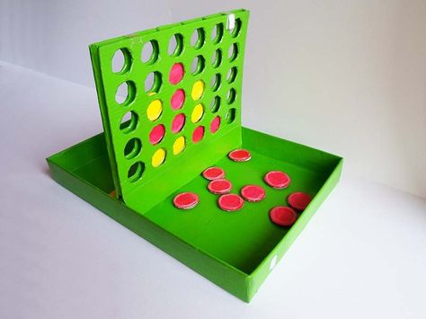 Connect Four is such a famous game that most of you must have played it at least once in your life! I had both the regular and pocket version when I was little and it's one of the games I played the most with. I still have the big one, even though some discs are missing... The base seems pretty easy to make so I thought I would try to build it using cardboard! As you can probably notice from my other instructables, I love cardboard because you can do so many different things with it! And let'... Cardboard Diy, Connect Four, Cardboard Box Crafts, Diy Games, Diy Cardboard, Using Acrylic Paint, Cardboard Crafts, Tutorial Diy, Paper Toys