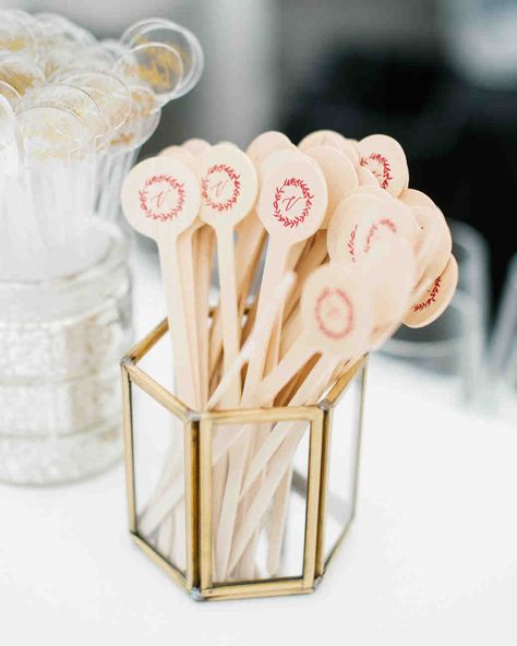 A Tuscan-Inspired Affair in St. Louis, Missouri | Martha Stewart Weddings - Design elements from the stationery suite were carried over into cocktail hour with these drink stirrers by Livia Paul. The couple chose acrylic stirrers with "cheers" in gold foil to accompany Monica's lighter signature cocktail while wooden stirrers with a burgundy wreath and a "V" were the match for Alex's heavier libation. Burgundy Wreath, Best Bridal Shower Games, Blush Wedding Centerpieces, Missouri Wedding Venues, Cocktail Stirrers, Wedding Signature Drinks, Tuscan Design, Tuscan Inspired, St Louis Wedding