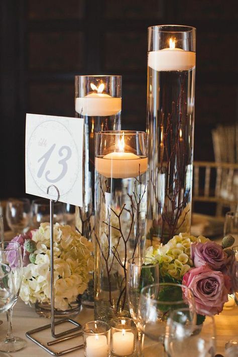 I like the floating candles with flowers around it but wouldn't want the twigs in the floating candles Spa Restroom, Branch Centerpiece, Water Centerpieces, Branch Centerpieces Wedding, Tattoo Modern, Floating Candles Wedding, Wedding Candles Table, Branch Centerpieces, Candles Flowers