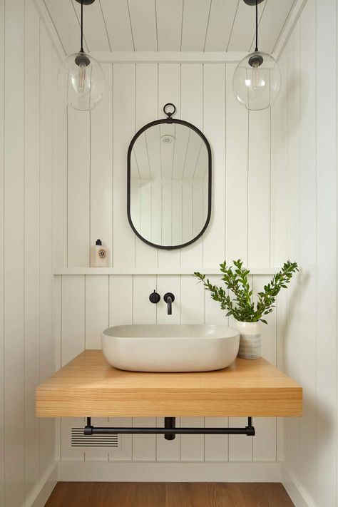 Photo 2 of 14 in Woodside Residence by Agnieszka Jakubowicz - Dwell Downstairs Loo, Wood Counter, Vessel Sink, Powder Room, Wood Paneling, Modern Bathroom, Hardwood Floors, Pendant Lighting, Wood