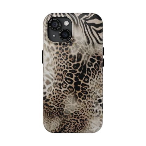 Elevate your phone with our animal print phone case. A gorgeous accessory that goes beyond safeguarding your phone, it's a statement piece that reflects your unique style--designed to spark conversations wherever you go. Protect your phone in style with our tough phone case. Compatible with iPhone and Samsung smartphones (check sizes for all available phone models). This lightweight phone case is impact-resistant thanks to its inner lining and Polycarbonate shell for total peace of mind.  Add a pop of color to your device with our top-tier cases. Here's why you'll love them: - Glossy finish - Lay-Flat bezel - Flexible rubber liner  - High quality materials  - UV protected: excellent resistance to outdoor weathering, longterm optical quality Care instructions: clean with a soft damp cotton Stockholm Style Phone Case, Zebra Print Phone Case, Camo Phone Case, Where To Buy Phone Cases, I Phone Cases Aesthetic, Iphone 15 Case, Iphone 13 Phone Cases, Cheetah Phone Case, Classy Phone Cases