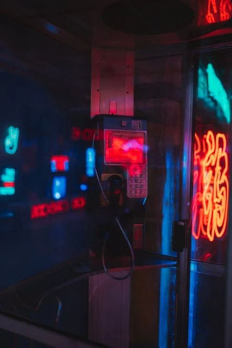 A Phone Booth with Reflecting Neon Sign · Free Stock Photo Phone Booth Aesthetic, Telephone Aesthetic Dark, Phone Booth Aesthetic Dark, London Phone Booth Photography, Red Phone Booth, Phone Booth, Dream City, Pay Phone, Light Reflection