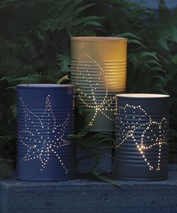 Recycled pinhole aluminum can lanterns Luminaria Diy, Can Lanterns, Tin Can Lanterns, Recycled Tin Cans, Recycled Tin, Tin Can Crafts, Garden Lanterns, Tin Cans, Can Crafts