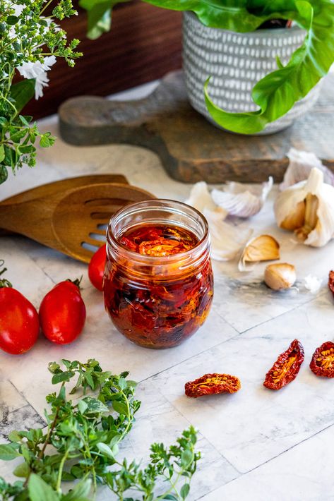 Homemade Sun-Dried Tomatoes | If you love the taste of sun-dried tomatoes, you'll love that they're easy to make at home. Homemade sun-dried tomatoes are also much less expensive than store-bought varieties. Plus, they taste even better! The concentrated flavor of sun-dried tomatoes is excellent in many recipes, from pesto to pasta sauce. And because a little goes a long way, you can use them sparingly to stretch your harvest. | cravethegood.com Marinated Sun Dried Tomatoes, Diy Sun Dried Tomatoes In Oven, Sun Dried Tomatoes In Olive Oil, Home Made Sun Dried Tomatoes, Sundried Tomato In Oil, Tomato Ideas, Tomatoes In Oil, Sundried Tomato Recipes, Make Sun Dried Tomatoes