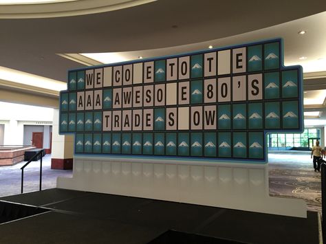 This game show board was an awesome outside-the-box addition to AAA's 80's themed trade show! Board Game Center Piece, Board Game Prom, Board Game Backdrop, Game Show Themed Party Ideas, The Game Of Life Decorations, Game Show Party Decorations, Game Show Party Ideas Decorations, Game Show Theme Party, Gameshow Set Design