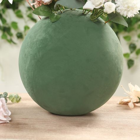 Quantity: 1 Floral Foam Ball Material: Styrofoam Color: Green Shape: Sphere Diameter: 12" Can be used for real, dried, or artificial flowers How to use: Soak in water until completely saturated. Cut foam to desired size to fit any container. Then add flowers. Features: Lightweight, Quick water absorption, Great holding power & Low drainage Wet Foam gives longer life to your plant and flower arrangements Wet Foam provides great structure to floral designs InformationAdditional Information: Perfec