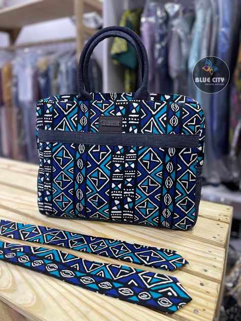 These collection of laptop/handbags are made with quality ankara/African print fabrics and a touch of jeans/leather. Carefully crafted to suit all your clothing and gadgets. Comes in a size of 16 inches by 13 inches. We do wholesale and retail. Send us a WhatsApp message +233240926564 Worldwide shipping assured #ankara #ankarabag #ankaralaptopbag #africanbag #laptopbag #africanprintbag #africanprintlaptopbag #ankaraladiesbag #ankarabagformen #africanbag Tod Bag, Blue Ankara, Laptop Handbags, Ankara Accessories, Ankara Bags, Traveling Bag, Tods Bag, African Bag, Laptop Handbag