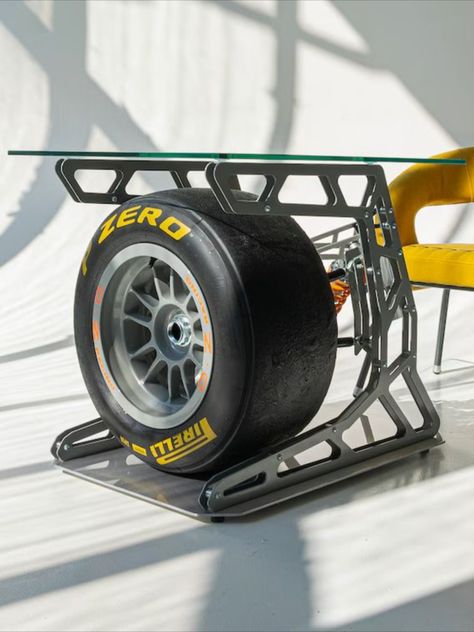 Formula One Car Wheel Turned into a Chic Coffee Table Tire Table, Wheel Table, Formula One Car, Cardboard Chair, Automotive Furniture, Chic Coffee Table, F1 Memes, Upcycled Home Decor, Ferrari F1