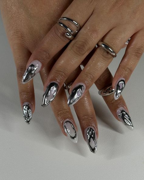 silver metals babyyyy Medium almond tips @dndgel cute bunny as base color #nailsnailsnails #nailart #gelxnails #naildesign #gelnails #gelmani #chrome #chromenails #silvernails #3dnailart #3dnails #nailsinstagram Chrome Nails Texture, Pewter Chrome Nails, Full Chrome Nails, Silver Flower Nails, Isolated Chrome Nails, Metallic Chrome Nails, 3d Chrome Nails, Almond Tips, Chrome Nails Silver