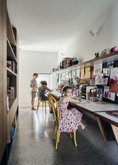 The kids' study has an abundance of toy storage Melbourne Architecture, Melbourne House, Kids Study, Terrazzo Flooring, Study Areas, House Elevation, Modern Kids, Home Sport, House Extensions