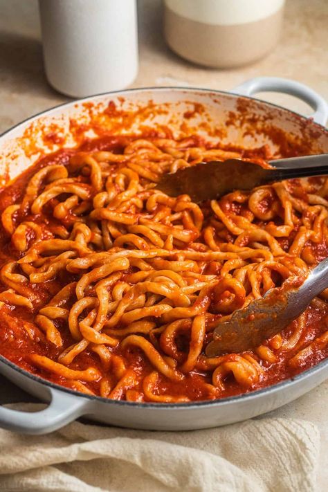 Skillet with pici in a tomato garlic sauce (all'aglione). Tomato Garlic Pasta Sauce, Garlic And Tomato Pasta, Pasta With Tomatoes And Garlic, Garlic Wine Sauce Pasta, Creamy Tomato Garlic Pasta, Tomato Garlic Pasta, Tomato Garlic Sauce, Tomato Sauce Pasta, Pici Pasta