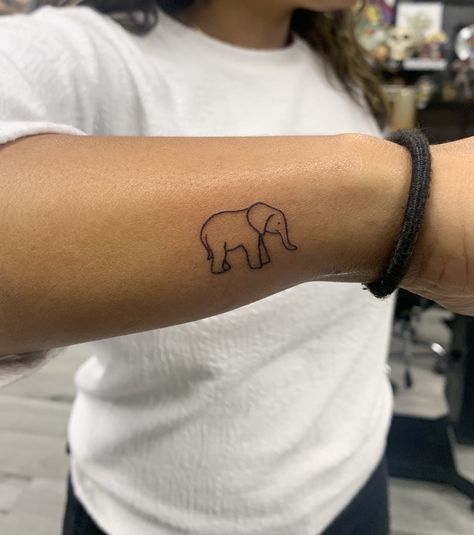 India Inspired Tattoos For Women, Elephant Tattoos Dainty, Elephant Tattoos On Wrist, Small Fine Line Elephant Tattoo, Blue Elephant Tattoo, Elephant Alzheimer’s Tattoo, Elephant Tattoos Small Simple, Simple Line Elephant Tattoo, Small Simple Elephant Tattoo