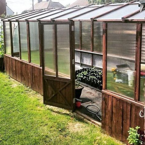 Here is a bunch of solid reasons why your yard could use the addition of a greenhouse, with 15 inexpensive pallet greenhouse plans & designs to choose from. #”greenhouseplans” Greenhouse Out Of Pallets, Make A Greenhouse, Pallet Greenhouse, Cheap Greenhouse, Conservatory Greenhouse, Diy Greenhouse Plans, Best Greenhouse, Build A Greenhouse, Indoor Greenhouse