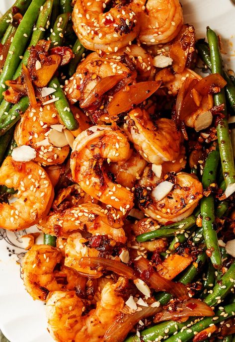 This recipe for chili crisp shrimp and green beans comes together in a flash for a light meal you can make any day of the week. The post Chili Crisp Shrimp and Green Beans appeared first on Tried and True Recipes. Chili Crisp Shrimp Dip, Chili Oil Shrimp, Fly By Jing Sichuan Chili Crisp Recipes, Chili Crisp Shrimp, Shrimp With Green Beans, Green Bean And Shrimp Recipes, Shrimp And Green Beans Recipe, Shrimp Green Beans Recipes, Shrimp And Green Beans Stir Fry