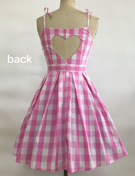 Pink & White Gingham Barbie Swing Dress 100% Cotton Machine Wash Cold, Line Dry Knee length Material Has No Stretch Blet included, which is designed to move around.  Hair bows available for purchase separately. Sizes --- -Bust（inch） ---Waist (inch）----Length From Waist To Bottom( inch) Xs         -- 32-33        ------    24           ------23 S       ---   34-35        ------     26             -----23 M     ---    36-37       ------      28            ----- 23   L         --   38-39       ------     30             -----23 XL        -- 40-42        ------     32-            ----23   2XL       --43-45        ------     35-            ---  23      3XL      --46-48        ------      38           ----23   4XL      -- 49-51        ------     41           ---  23    Order will be shipped in 2- Gingham Barbie, Retro Summer Outfits, Pink Heart Dress, Pink Gingham Dress, Classic Skirts, Pastel Outfit, Stripped Dress, Heart Dress, Pink Gingham