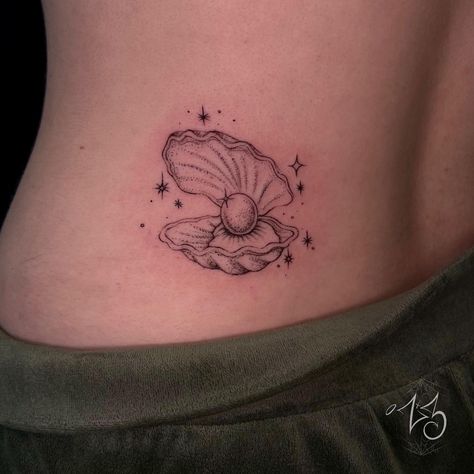 A delicate dot work clam shell on the lower back for Riley! ✨Thank you again! Studio Owner/Tattoo Artist - Zoe Litz @zx3bih Located @zx3artistry in Cocoa Beach, Florida Tattoo made with love using supplies by @dead_raven_tattoo_supply @painfulpleasures @allegoryink @recoveryaftercare @inkjetstencils #zx3ink #zx3artistry #zx3 #clamshelltattoo #clamtattoo #dotwork #dotworktattoo #cocoabeachtattoo #lowerbacktattoo #seashelltattoo #femaletattooartist Pearl In Clam Tattoo, Pearl Clam Tattoo, Tattoos With Pearls, Shell Pearl Tattoo, Ocean Moon Tattoo, Clam And Pearl Tattoo, Sea Shell Tattoos For Women, Snail Shell Tattoo, Clamshell Tattoo