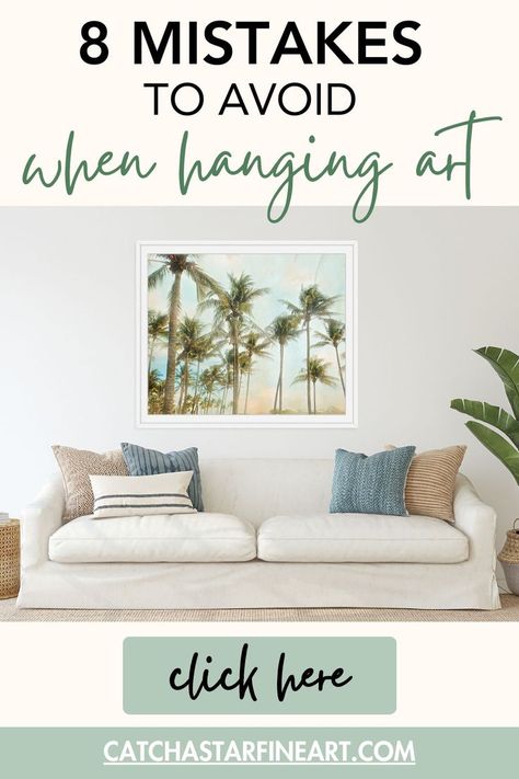 Article 8 Mistakes To Avoid When Hanging art, showing a coastal decor living room with palm tree photo above couch. Wall Decor Size Guide, How To Style Paintings On Wall, Artwork Groupings On Wall, Hanging Wall Art Layout, Wall Gallery Hanging Options, How To Place Wall Art, How Big Should Art Be On Wall, Arranging Wall Art, Bedroom Portrait Ideas