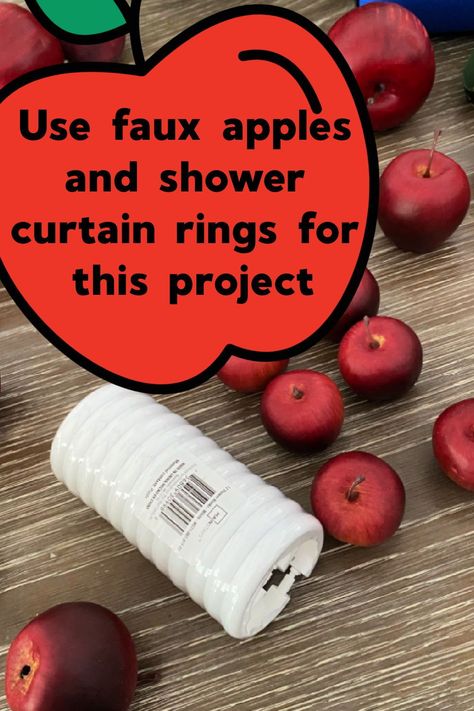 Use faux apples to make these for your dinner table this fall. Apple Theme Table Decorations, Apple Centerpieces For Table, Fall Tea Party Ideas Decorations, Apple Tablescapes, Apple Fall Decor, Apple Decorations For Fall, Apple Centerpiece Ideas, Thanksgiving Table Scapes Ideas, Apple Table Decorations