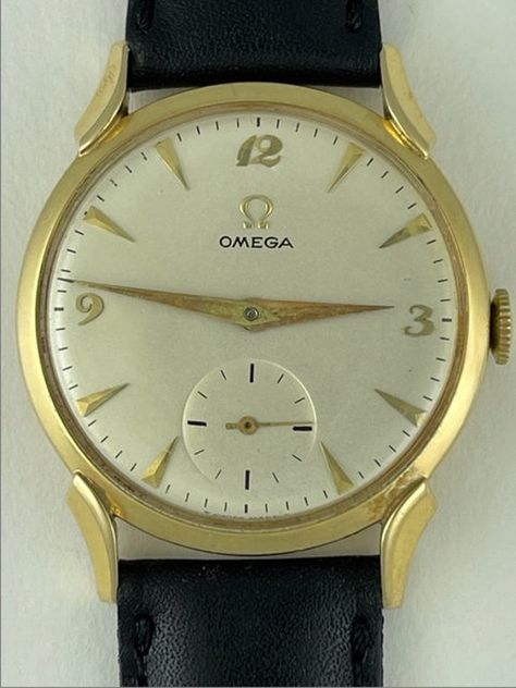 Omega Solid 14K Gold Cal 410 ref BX 6550 25530 Queens Omega Vintage 1952 Swiss Made Weight 21 Grams without the strap. In Great Working Condition, Keep Very Accurate Time. Just recently was serviced. Please have a look at our vintage watches we have constantly listed MovementManual winding Movement/Caliber410 Number of jewels17 Case Case materialYellow gold Case diameter33 x 39 mm Thickness9 mm Lug 18mm Omega Watches Seamaster, Omega Seamaster Automatic, 21 Grams, Gold Money, Calendar Date, Gold Caps, Vintage Omega, Pocket Watches, Gold Case