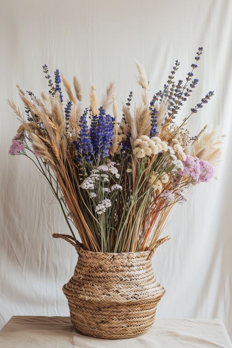 Add elegance and personality to your wedding with floral centerpieces, a timeless decor choice. See more inspiration here. Centerpieces With Dried Flowers, Dried Floral Centerpieces, Boho Centerpieces Wedding, Contemporary Wedding Decor, Woodland Wedding Centerpieces, Minimalist Centerpiece, Wedding Centerpiece Ideas, Tall Floral Arrangements, Romantic Wedding Centerpieces