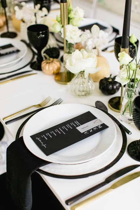 Modern Halloween black, white and gold table setting for a chic All Hallows Eve Soiree. Minimalistic monochrome Halloween dinner party. Inspiration for your very own black white and gold Halloween celebration. Halloween decor, tablescape, balloon installations, pumpkins sweet treats, spooky cocktails and more... www.just-bespoke.com White Wedding Table Setting, Spooky Cocktails, Halloween Dinner Party, Gold Table Setting, Dinner Party Table Settings, White Table Settings, Halloween Party Dinner, Modern Halloween, Dinner Party Table