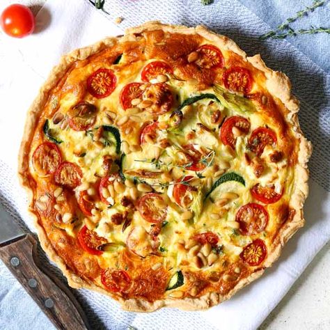 Courgette & Tomato Quiche with Feta Vegetarian Quiche Recipes, Feta Quiche, Vegetarian Quiche, Tomato Quiche, Ottolenghi Recipes, Feta Recipes, Cheese Quiche, Grape Salad, Pasta Fatta In Casa