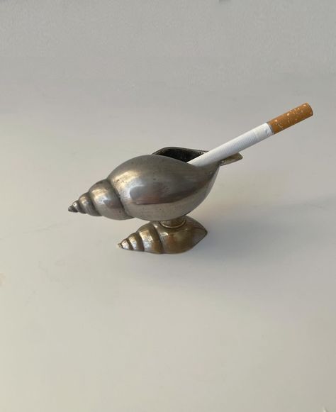 SOLD Metallic #Ashtray in #Shell form with silvering 1970s Found in Napoli, Italy In good vintage condition #1970svintage #vintageashtray Interior Design Items, Vintage Ash Trays, Ash Trays Aesthetic, Unique Ashtrays, Ash Tray Ideas, Cool Ashtrays, Bucket Diy, Ashtray Vintage, Vintage Ashtrays