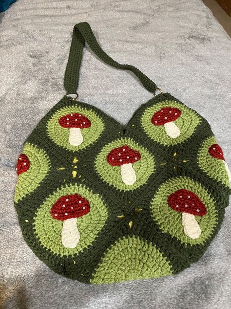 Hand crocheted, mushroom motif granny-square, saddlebag. Lined. Mushroom Crochet Bag, Aesthetic Granny Square, Mushroom Bag Crochet, Crochet Cottage Core, Crochet Mushroom Bag, Crocheted Mushroom, Confection Au Crochet, Crochet Mushroom, Crochet Design Pattern