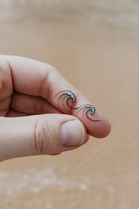 20 Beach Tattoos for Women That Capture Summer Vibes – inkspiredtattoos.com Ocean Themed Tattoos For Women, Beach Tattoos For Women, Ocean Themed Tattoos, Simple Anchor Tattoo, Sand Dollar Tattoo, Summer Tattoos, Dollar Tattoo, Beach Tattoos, Sailboat Tattoo