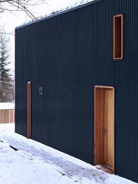 Two Story Contemporary Eco Home with Metallic Shell by Ralph Germann Black Building, Black Houses, Wood Facade, Metal Facade, House Cladding, Metal Siding, Casa Container, Timber Cladding, Exterior Cladding