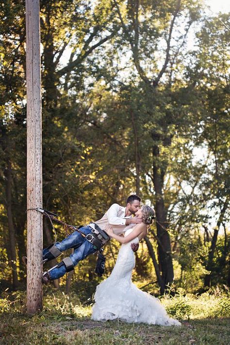 A Lineman groom decided to put his gear on for a portrait with his new bride.  The wedding day was in Harrisonville, MO. Lineman Picture Ideas, Lineman Wedding Photos, Lineman Wedding Ideas, Future Photography, Power Lineman, Lineman Gifts, Cowgirl Wedding, Boo Thang, Couples Pictures