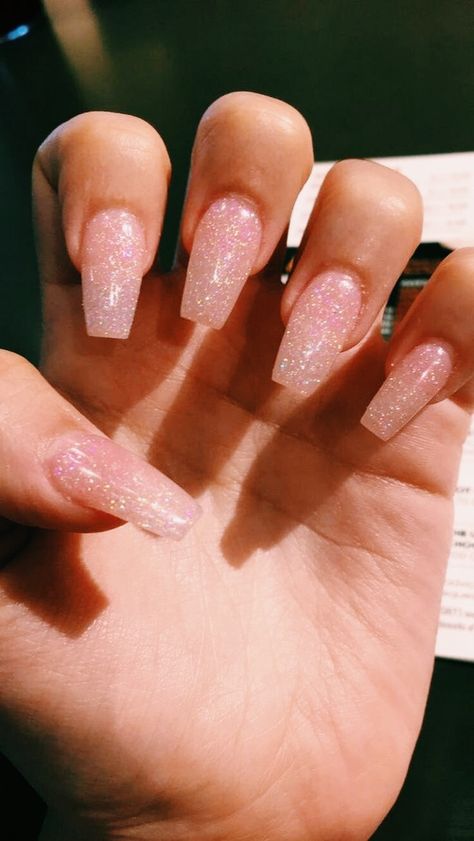 Grad Nails Acrylic Pink, Light Pink Nails With Gold Glitter, Pink Glittery Nails Almond, All Pink Glitter Nails, Pink Sparkly Acrylic Nails Glitter, Light Pink With Sparkles Nails, Glittery Light Pink Nails, Natural Pink Nails With Glitter, Light Pink Nails Sparkle