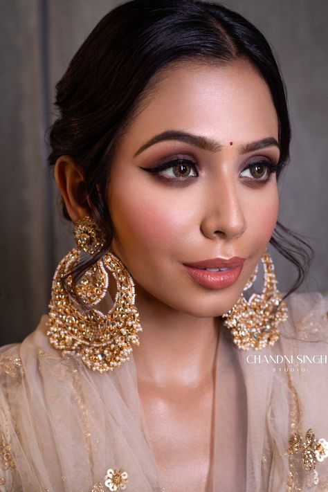 Brown smokey eyes with a  winged eyeliner  & oversized chandbalis. Makeup by Chandni Singh Bridal Smokey Eye Makeup, Brown Smokey Eyes, Jewellery Makeup, Indian Wedding Makeup, Brown Smokey, Smokey Eye For Brown Eyes, Indian Makeup, Power Dressing, Smokey Eyes