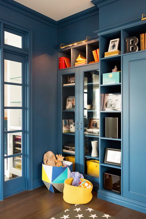 Whether used for playing fort or playing backgammon, this ​room sets a perfectly jestful yet elegant scene. ​ Blue Playroom Walls, Vaulted Playroom, Elegant Playroom, Contemporary Playroom, Sophisticated Playroom, Playroom Refresh, Playroom Update, Upstairs Playroom, Blue Playroom