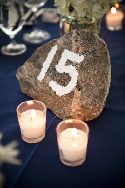 rock table numbers Ceremony Backdrop Diy, Creative Wedding Table Numbers, Beach Wedding Table Numbers, Vintage Table Numbers, Beach Wedding Groom Attire, Beach Table Decorations, Dreamy Beach Wedding, Ideas For Beach Weddings, Buffet Wedding Reception