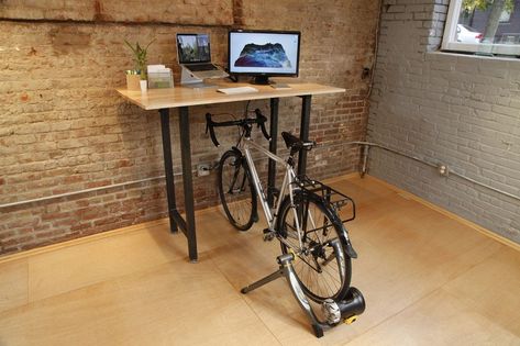 A standing desk with a difference - mount your bike on a turbo trainer and get some exercise whilst you work at your desk. Bike Storage Design, Bike Storage Ideas, Small Wood Desk, Wooden Office Furniture, Storage Design Ideas, Classic Office Furniture, Indoor Bike Rack, Indoor Bike Storage, Wood Office Furniture