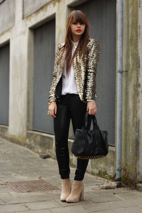 A gold sequin blazer and black leather skinny pants feel perfectly suited for weekend activities of all kinds. This outfit is complemented perfectly with camel suede ankle boots.   Shop this look on Lookastic: https://lookastic.com/women/looks/blazer-dress-shirt-skinny-pants/15460   — Gold Necklace  — White Dress Shirt  — Gold Sequin Blazer  — Black Leather Skinny Pants  — Black and Gold Studded Leather Tote Bag  — Tan Suede Ankle Boots  — Gold Ring Sequin Jacket Outfit, Gold Sequin Blazer, Gold Sequin Jacket, Glitter Jacket, Gold Blazer, Glitter Fashion, Gold Jacket, Sequin Blazer, Sequin Jacket