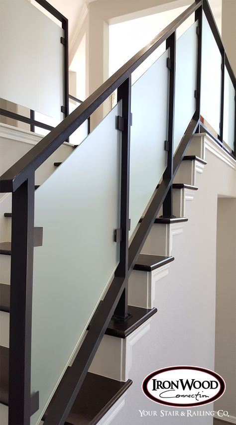 Glass and wrought iron systems are designed through our custom staircase services. This staircase is made of solid wrought iron and thick glass panels. These unique components bring a modern look and feel to any home. We offer parts, install services, and custom components throughout Texas. Click the image for more information. Ms Railing With Glass Design Balcony, Ms Railings For Stairs, Wrought Iron Railings Interior, Ms Railing Design For Staircase, Ms Staircase Designs, Glass Railing Stairs Modern, Ms Railing Design Balcony, Staircase Glass Railing Design, Ms Railing