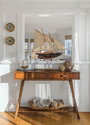 Sailboat and nautical theme interior design in Goose Rocks oceanfront home in Southern Maine Nautical House Interior, Southern Nautical Decor, Nautical Interior Design Living Rooms, Gold Nautical Decor, Nautical Interior Design Modern, Nautical Theme Home Decor, Old Nautical Decor, Nantucket Homes Interiors, Seaside Home Interiors