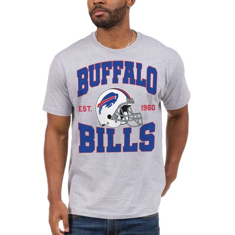 PRICES MAY VARY. 60% Cotton, 40% Polyester Made in the USA or Imported Machine Wash The Buffalo Bills NFL Helmet Fan Tee - Relaxed fit. Unisex Sizing. Machine wash according to care instructions. Our Bills Adult Unisex Fan T-Shirt is perfect for the next big game and makes a great gift for the Buffalo fan in your life. Billieve! This Bills Shirt will stand out for casual wear, tailgates and gamedays. Officially Licensed by the NFL About this item: Buffalo Bills NFL Helmet Fan Tee    Billieve! Sh Football Fan Shirts, Bills Shirts, Garment Construction, Nfl Apparel, Food Clothes, Fan Shirts, Graphic Logo, Self Service, Buffalo Bills