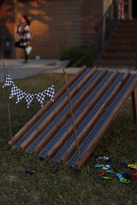 Home Depot bought wood and tape from Amazon! Super quick and easy race, car ramp for any child birthday. Was used for a “fast one” birthday party. Cars Themed Birthday Party Activities, 2 Fast Birthday Activities, Racecar Birthday Games, Cars Birthday Party Games Activities, Pit Stop Party, Two Fast Birthday Party Boy Activities, Hot Wheels First Birthday Party Ideas, Fast One Decorations, Hot Wheels Birthday Games