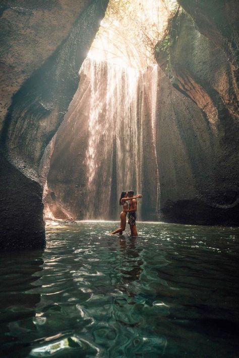 Aesthetic picture of Tukad Cepung Waterfall. Discover more photos of Justina & Vainius with On The Road Again Waterfall Aesthetic Couple, Bali Couple Photos, Couple Waterfall, Waterfall Pics, Bali Couple, Tukad Cepung, Waterfall Bali, Bali Waterfalls, Paradise Places