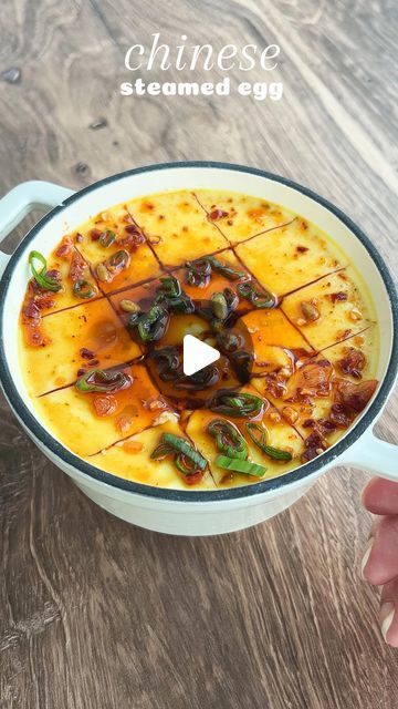 Trang Nguyen | NYC Food Content Creator on Instagram: "✨CHINESE STEAMED EGG🥚

Here’s an eggcelent way to guzzle down 24g of protein‼️ steaming the eggs changes the texture of the eggs to be smooth and silky

This recipe uses 4 eggs and maybe you’re thinking, “I can’t eat more than 2 eggs in one sitting” cause tbh I barely can 😂 but these personalized Chinese steamed eggs make it so easy! It comes together in 15 minutes and is a delicious high protein breakfast 😌

Ingredients
⚡️4 eggs, I used @organicvalley 
⚡️1 1/4 cup of water or chicken broth
⚡️1/2 tsp salt
⚡️coconut aminos, I used @coconutsecretofficial or soy sauce
⚡️chili oil, I used @flybyjing 
⚡️scallions
⚡️sesame oil

Directions:
1. Whisk together eggs, salt and water until combined. Strain through a fine mesh sieve to remove an Chinese Egg, Steamed Eggs, Breakfast Ingredients, Coconut Aminos, Egg Dishes, Food Content, Cup Of Water, High Protein Breakfast, Egg Dish