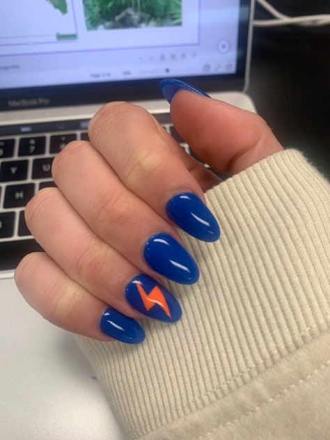 Okc Thunder Nails, Nails With Lightning Bolt, Orange And Blue Nails Design, Orange Blue Nails, Blue Orange Nails, Orange And Blue Nails, Nails With Orange, Lightning Bolt Nails, Orange Lightning